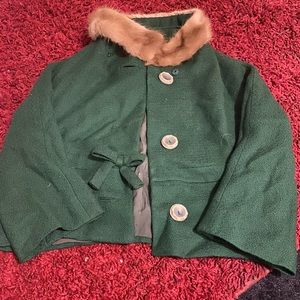 Vintage green waist coat with fur collar and bow
